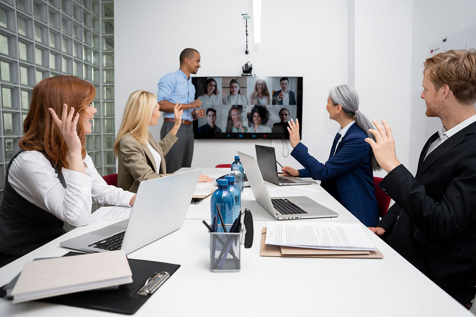 company team at conference room working with remote team.jpg