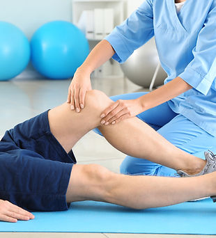 physiotherapist-working-with-male-patient-rehabilitation-center.jpg