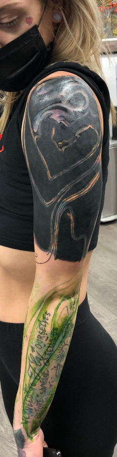 blackout tattoo freshly tattooed