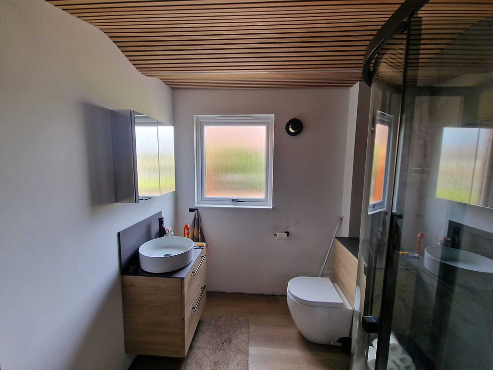 New bathroom with a white sink and toilet