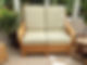 Wicker sofa with new foam and covers in conservatory