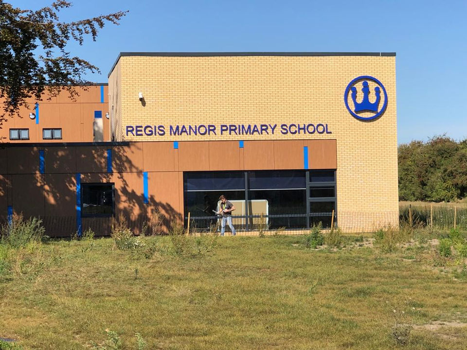 blue regis manor primary school sign