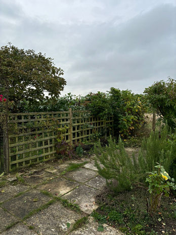 stone floor garden overlooking a cloudy sky