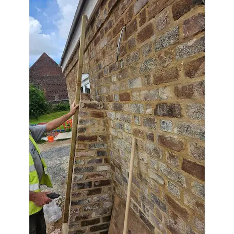 old brick wall with new pointing