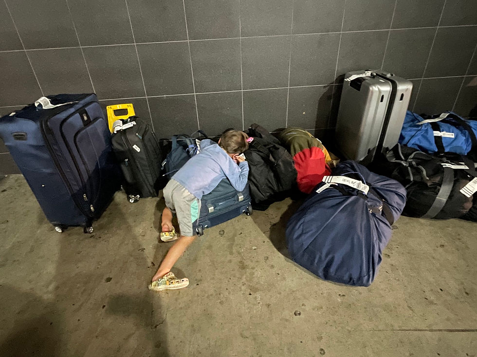 Airport, Bags, Boy asleep on bags at airport