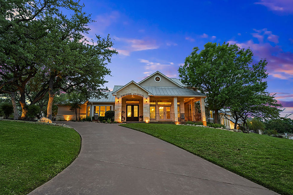 home with a new asphalt driveway