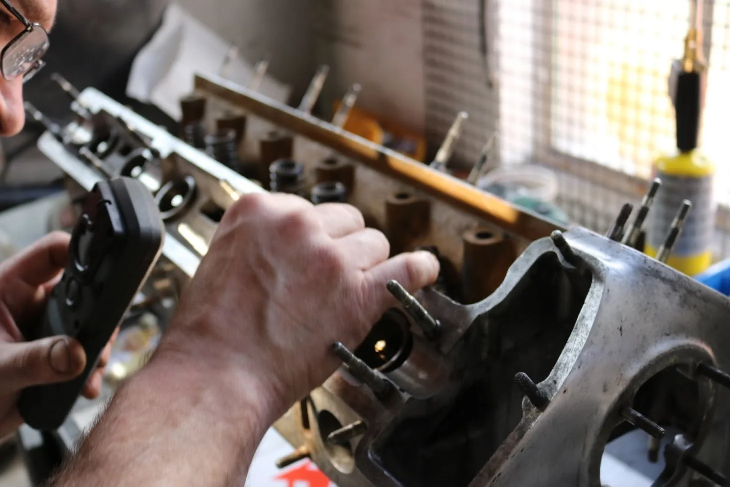 A Jaguar e-type engine being handbuilt by Automo.