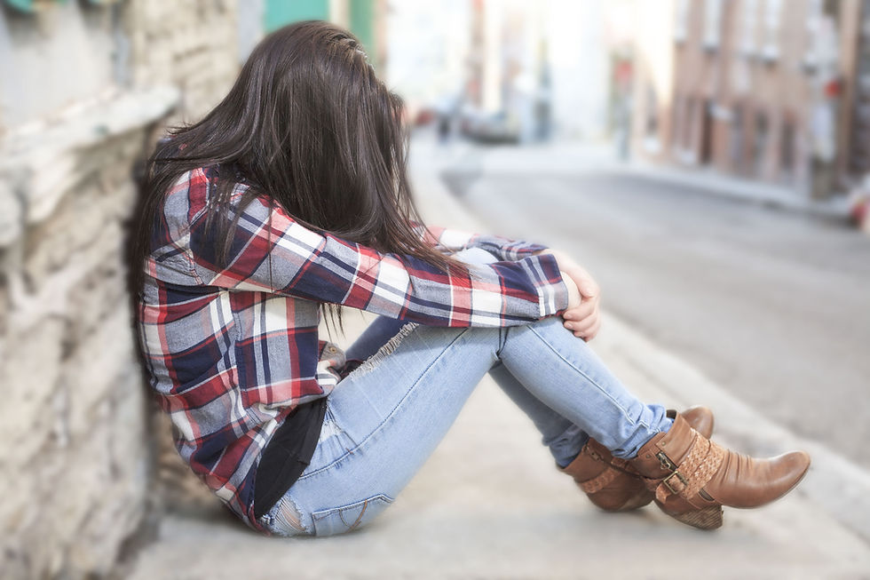 Woman Sitting Alone
