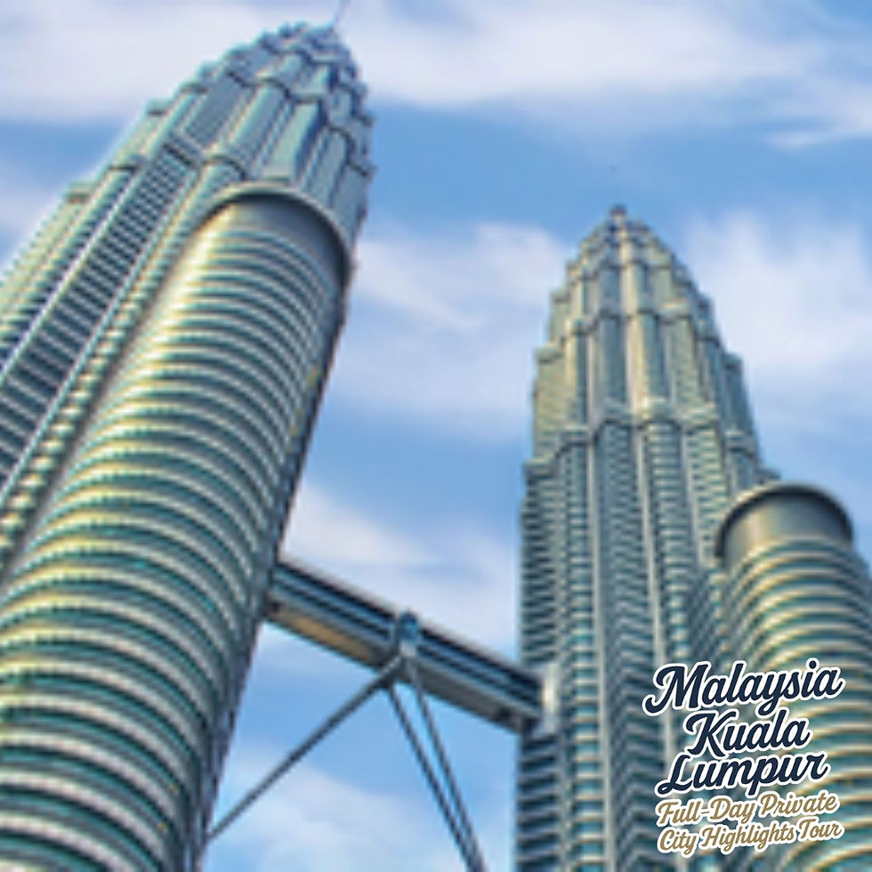 Close-up upward angle of the iconic Petronas Twin Towers with skybridge in Kuala Lumpur, Malaysia, against a partly cloudy sk