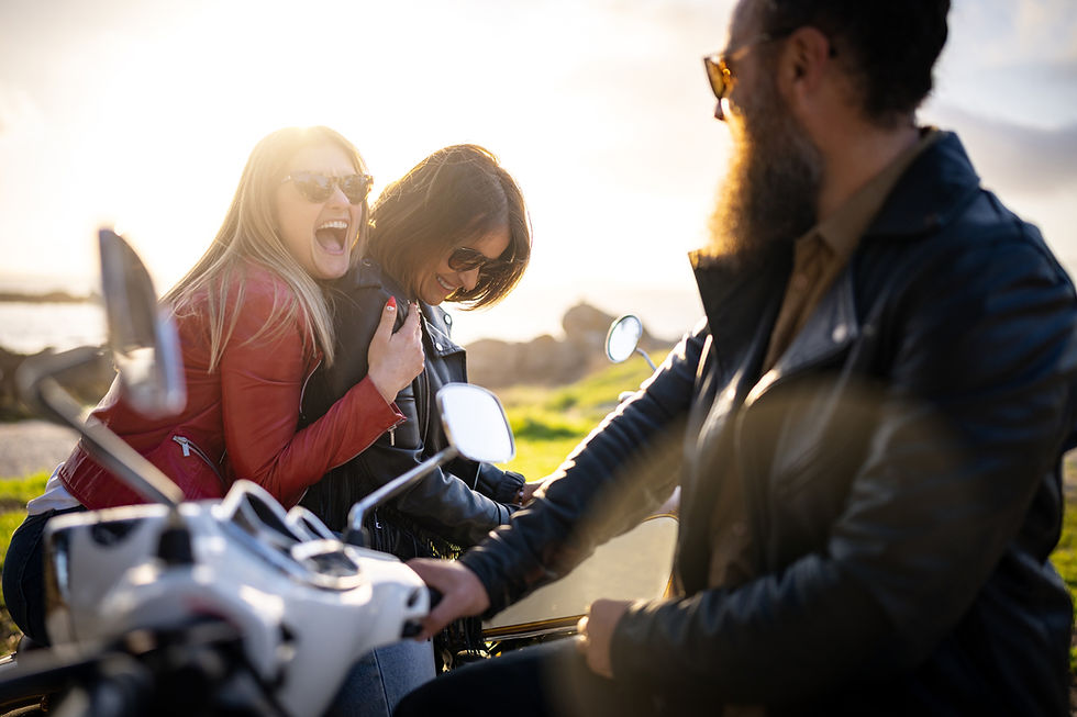Friends outdoors with motorbikes having fun
