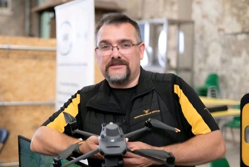 myself holdign one ouf our drones