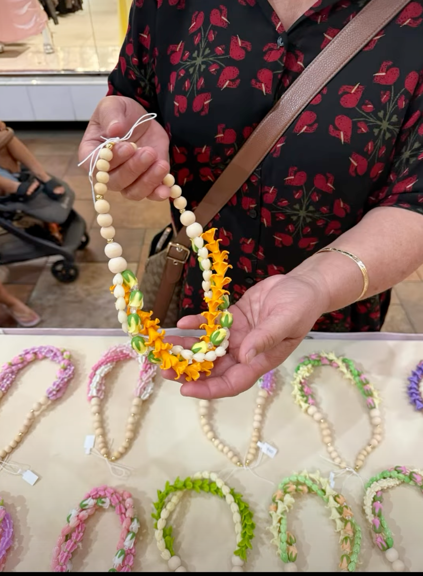 Traditional Hawaiian handicrafts including lauhala weaving, lei and koa woodwork in Honolulu