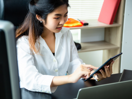 HR manager using an automated employee onboarding system to welcome and prepare a new team member.