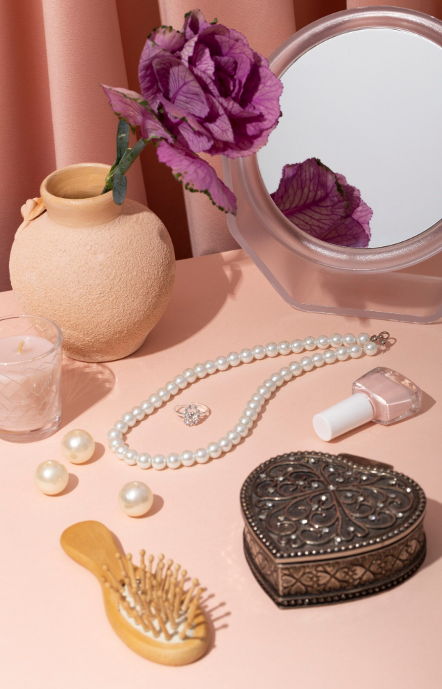 Fall 2026 fashion accessories featuring floral brooches, pearls and statement jewelry