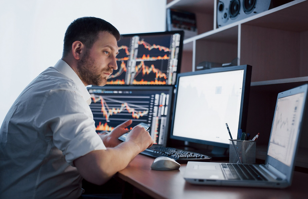 Traders monitoring global markets and Federal Reserve interest-rate expectations