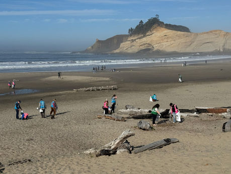 SOLVE volunteers collecting litter and marine debris at Pacific City, Oregon Coast