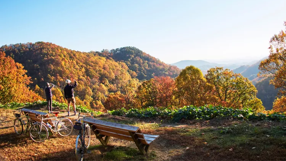 Panoramic view of colorful fall foliage covering the Blue Ridge Mountains near Black Mountain, North Carolina.
