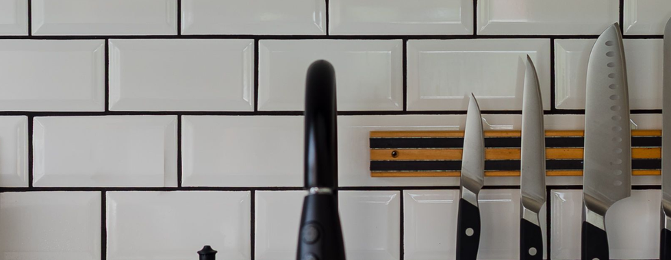 Kitchen detail with sink at Beach & Basecamp vacation rental in Old Fort North Carolina