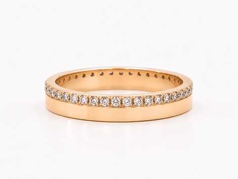 18k Yellow gold cigar wedding ring with diamonds