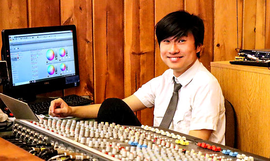 Matthew and mixer console.jpeg