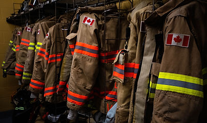 Image of firefighter uniforms hanging up