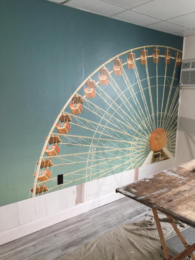 Wallpaper mural being installed
