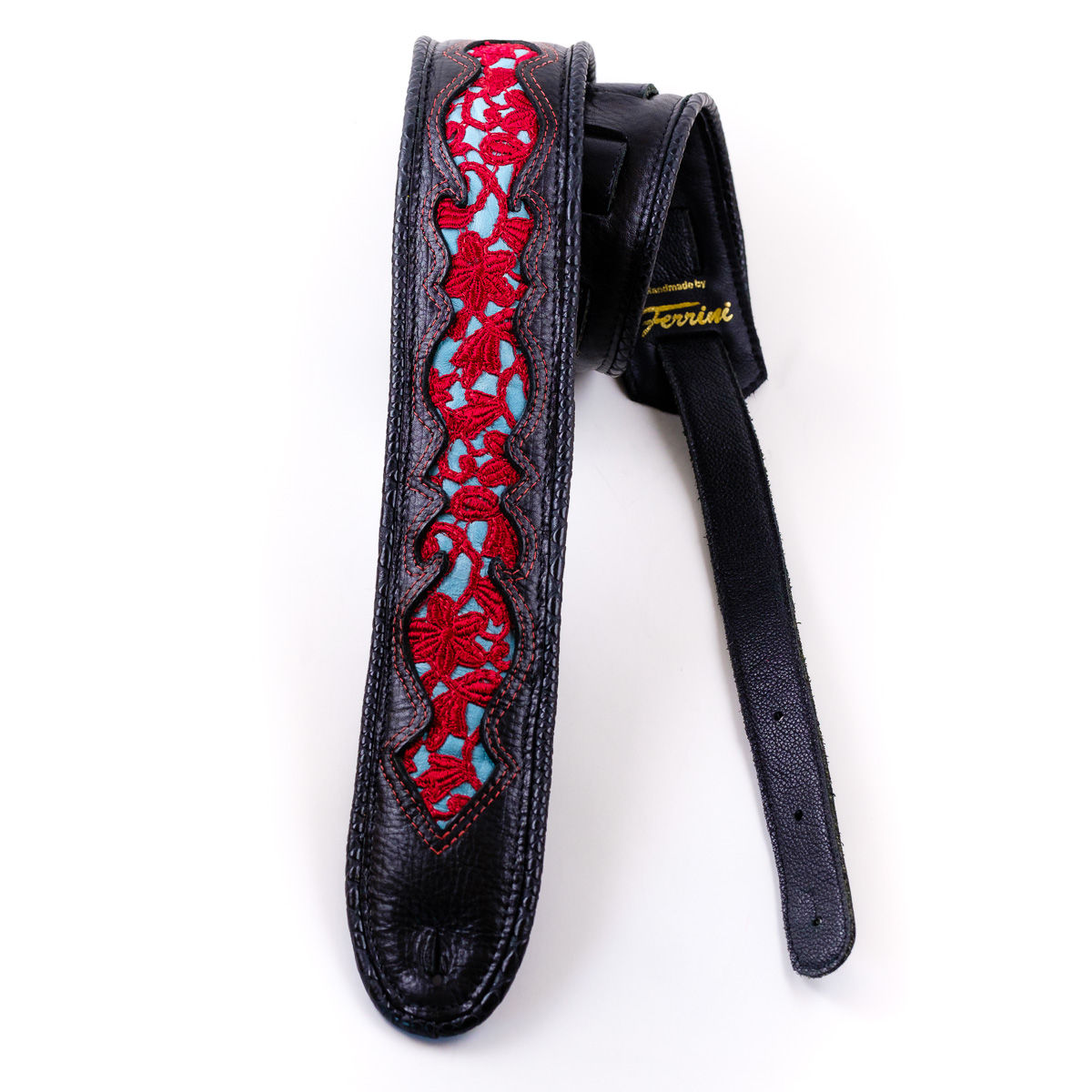 guitarstrap: red lace in light blue window