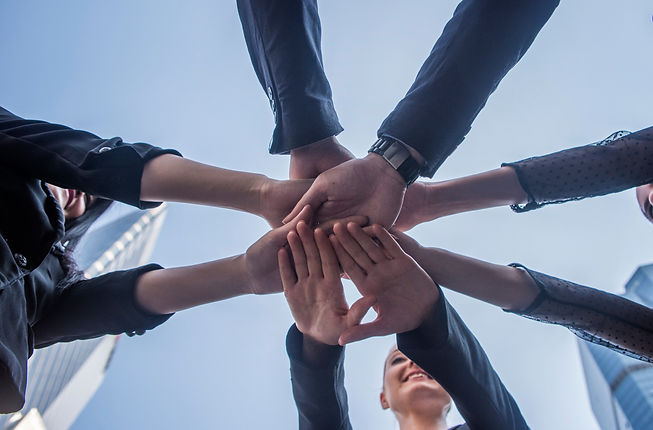 Many hand of young business people join team work out office . this hand of group corpora