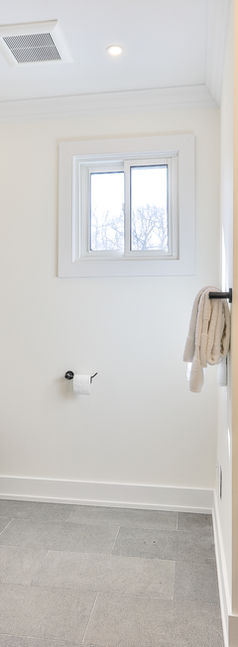 Bathroom with glass-enclosed tub and modern fixtures from West Point Toronto permit drawings for interior renovation.