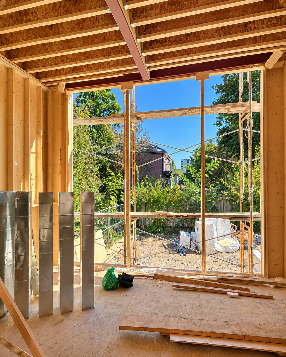 Interior framing at Pine St with large window and sliding door openings letting in daylight