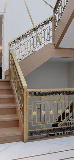 Photo of wooden staircase with modern railing.