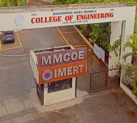 Entrance of Marathwada Mitra Mandal's College of Engineering in Pune, with signs for MMCOE and IMERT. Road visible in background.