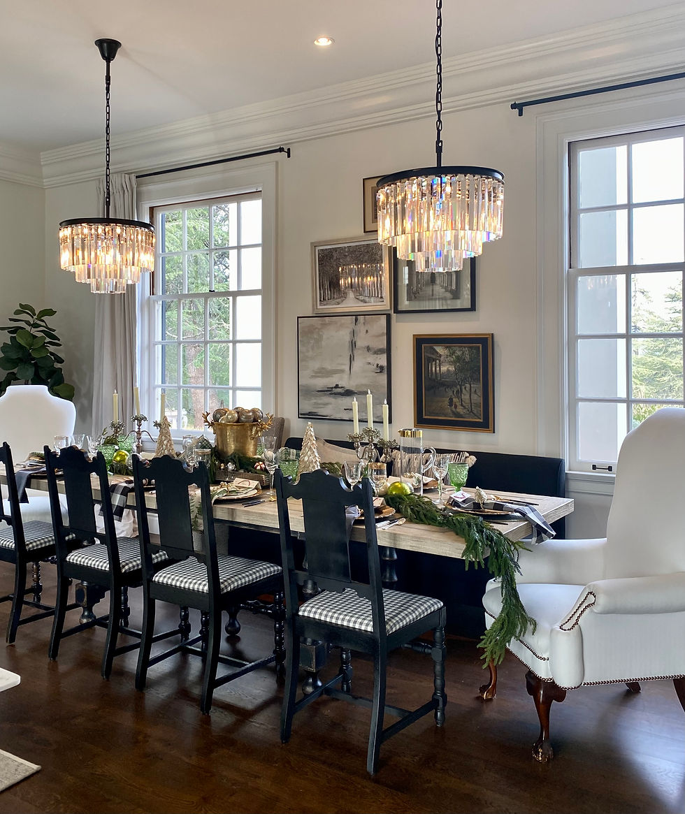 Black and white dining room at Rock Haven Farm dressed with traditional holiday decor.