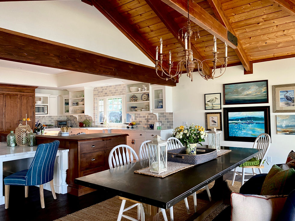 Dining space in traditional lake house kitchen design.