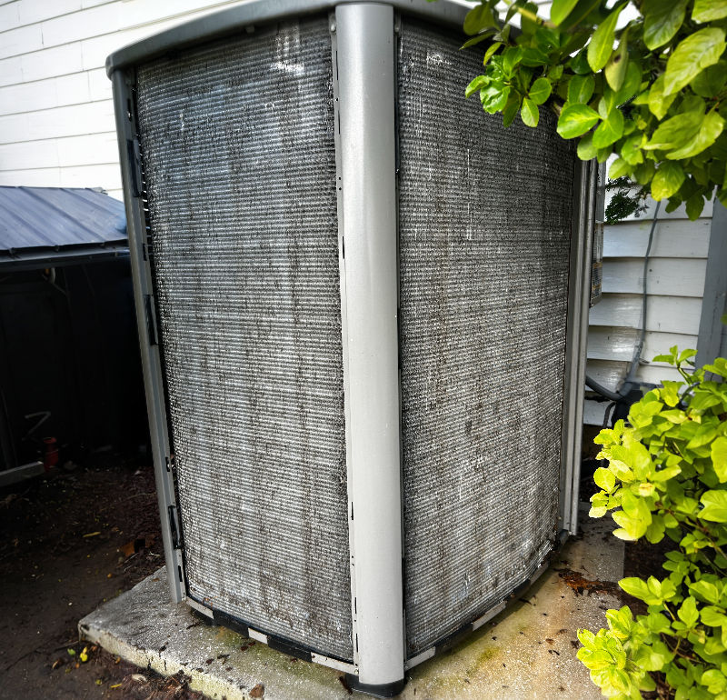 Air conditioning condenser coil deep cleaning to remove heavy debris and restore airflow – HVAC maintenance in Manalapan NJ
