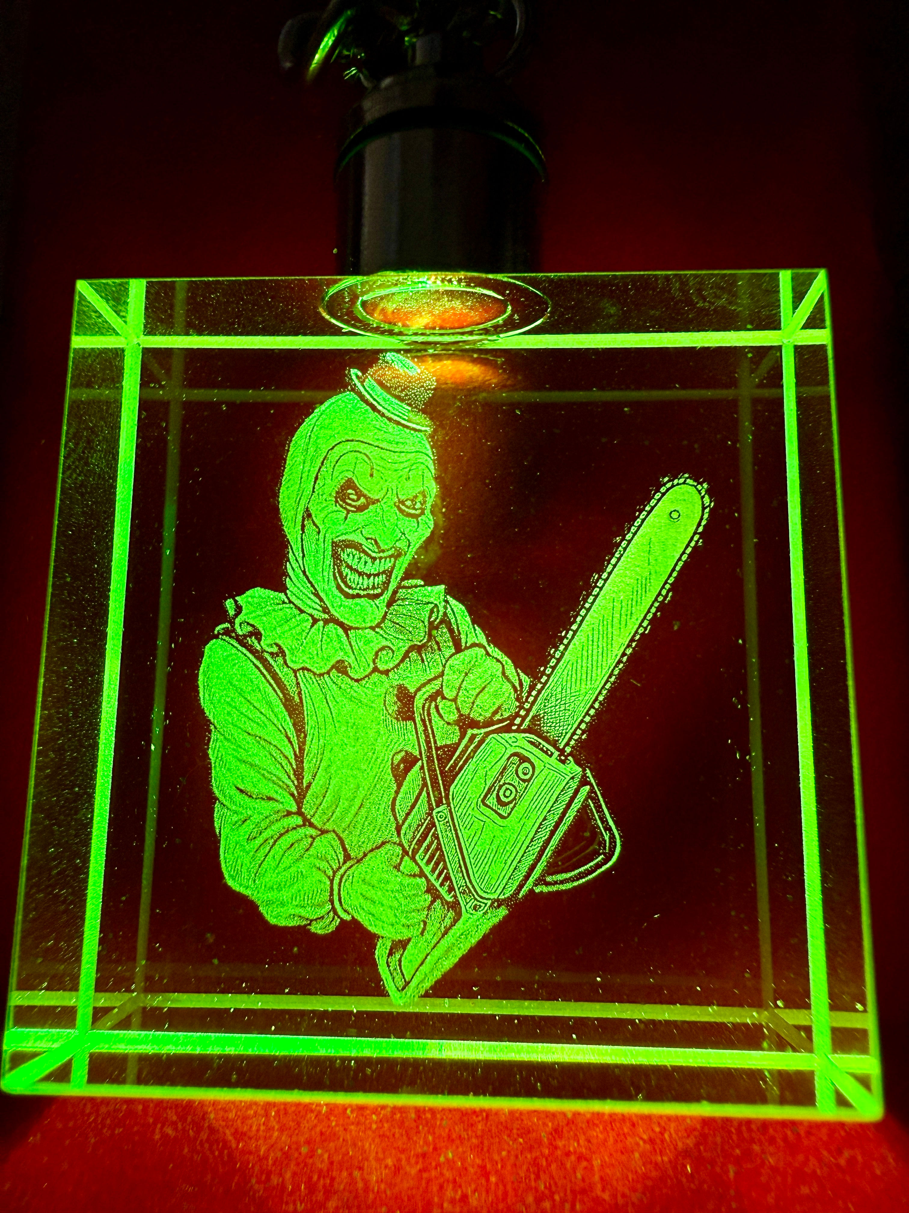 Terrifier Inspired Inner Engraved K9 Crystal Keychain With Multicolour LED