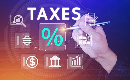vecteezy_business-using-computer-to-complete-individual-income-tax_27117904.JPG