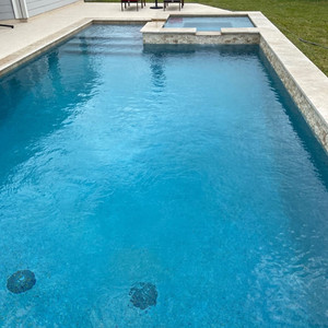 Clean & classic geometric Pool with Spa in Katy.