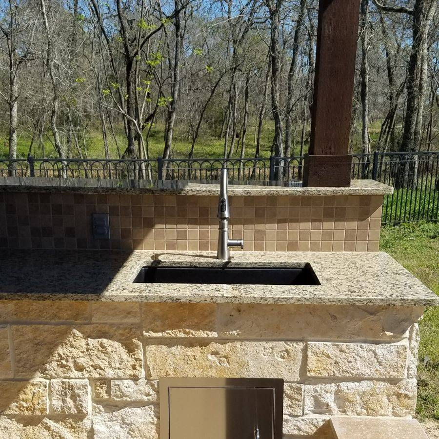 Stone Entertaining Pavilion with Tongue + Groove Ceiling and Entertainment Wall
