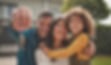 Happy family holding house keys, symbolizing expanded homeownership access through SmartBuy™ DPA solutions