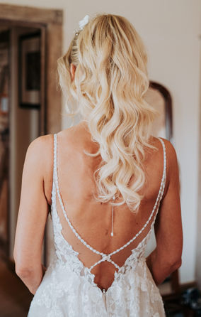 Bridal high ponytail on blonde hair.