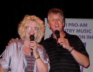 7. Sally and husband Brian singing at Sky City, NZ.jpeg