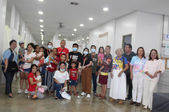 After surgery, the children with cleft and their families takes a picture with charity organization staff