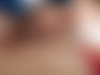 A quiet post-hookup moment—two women in bed, one woman’s hand gently caressing the other’s.