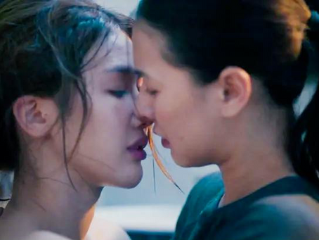 Thara and Vicky lean in for a near kiss while hiding in a broom closet after breaking training rules in Heart Code.