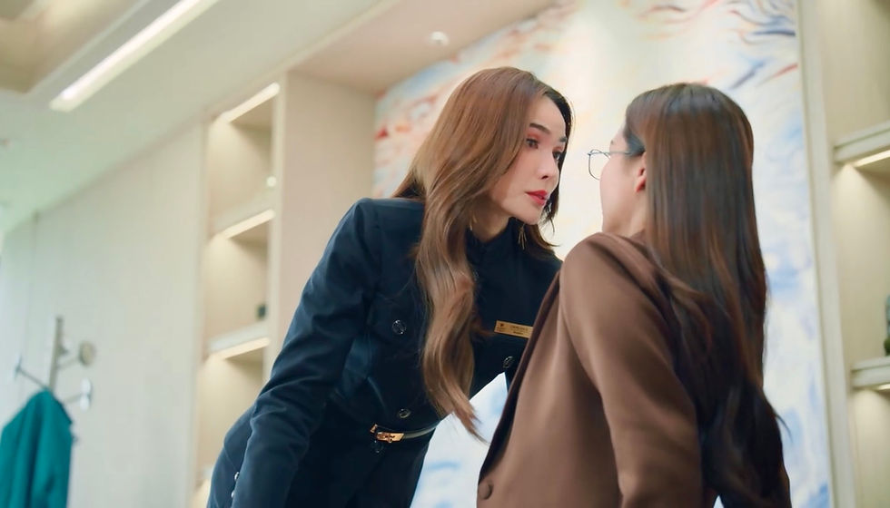 Lada leans in confidently toward Apo in her office, creating a tense moment, in The Water EP1.