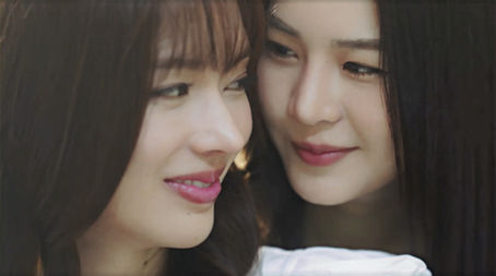 Close-up of Rose and Din leaning in with affectionate smiles, capturing a tender romantic moment in The Earth Episode 6.