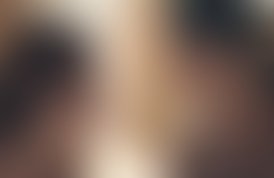 Vicky and Captain Thara lean toward each other in a warm kitchen setting, their faces close as romantic tension builds.