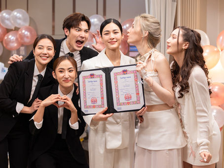 Aira and Tawan celebrate with friends in a hospital chapel after signing their marriage certificate in Only You EP13 — laughing and posing for a playful photo.