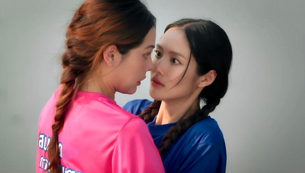 Klao steadies Si after she slips into the pond, leaving them face-to-face in an intimate moment while fishing.